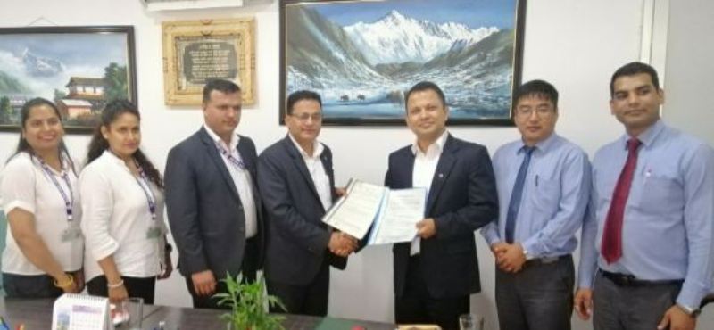 राष्ट्रिय बीमा कम्पनी र मुक्तिनाथ विकास बैंक बीच व्यवसायीक सम्झौता